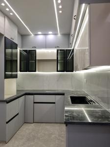 Kitchen Image of 1350 Sq.ft 4 BHK Apartment / Flat for sale in Saarthi Lavish Homes by Saarthi Builders, Sector 15 Dwarka New Delhi for Rs. 11500000