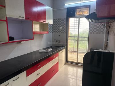 Kitchen Image of 910 Sq.ft 2 BHK Apartment / Flat for sale in Happy Sarvodaya Trilok, Thakurli Thane for Rs. 7500000