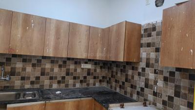 Kitchen Image of 970 Sq.ft 2 BHK Apartment / Flat for rent in Prateek Grand City, Siddharth Vihar Ghaziabad for Rs. 23000