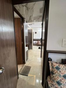 Living Room Image of 585 Sq.ft 2 BHK Apartment / Flat for rent in Lodha Amara, Kolshet Thane for Rs. 40000