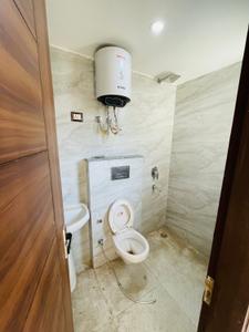 Bathroom Image of 990 Sq.ft 3 BHK Apartment / Flat for sale in Rajpur Khurd Extension New Delhi for Rs. 6500000
