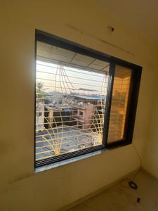 Bedroom Image of 550 Sq.ft 1 BHK Apartment / Flat for rent in Kopar Khairane Navi Mumbai for Rs. 16000