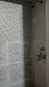 Bathroom Image of 585 Sq.ft 1 BHK Apartment / Flat for sale in Aditya Urban Homes Phase 1A, Bamheta Village Ghaziabad for Rs. 3500000