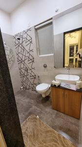 Bathroom Image of 1352 Sq.ft 3 BHK Apartment / Flat for sale in Kosmic Kourtyard Phase 2, Wagholi Pune for Rs. 7652000