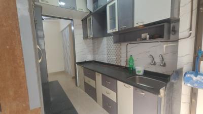 Kitchen Image of 980 Sq.ft 2 BHK Apartment / Flat for rent in Mohan Willows I, Badlapur East Badlapur for Rs. 14000