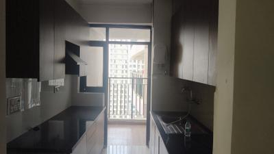 Kitchen Image of 1310 Sq.ft 2 BHK Apartment / Flat for rent in Cosmos Express 99, Sector 99 Gurgaon for Rs. 27000