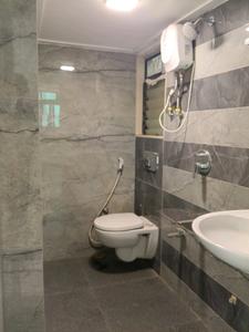 Common Bathroom Image of 597 Sq.ft 1 BHK Apartment / Flat for sale in Madar Signature, Mira Road East Mira Bhayandar for Rs. 7600000