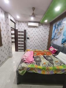 Bedroom Image of 950 Sq.ft 2 BHK Builder Floor for rent in Ramesh Nagar New Delhi for Rs. 28000