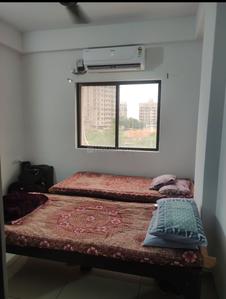 Bedroom Image of PARUL PG in Bhayli, Vadodara