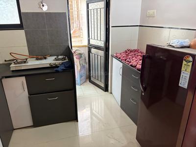 Kitchen Image of 920 Sq.ft 2 BHK Apartment / Flat for rent in Samraat Apna Ghar, Gangapur Nashik for Rs. 21000