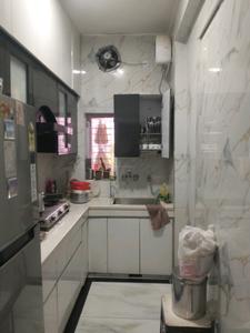 Kitchen Image of 1200 Sq.ft 3 BHK Apartment / Flat for sale in Arunodaya apartment, Vikaspuri New Delhi for Rs. 16500000