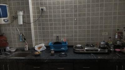 Kitchen Image of 850 Sq.ft 2 BHK Apartment / Flat for sale in Orchid Paradise, South Bopal Ahmedabad for Rs. 6500000