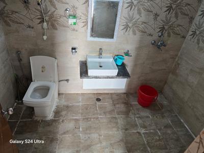 Bathroom Image of 435 Sq.ft Studio Studio for rent in Paramount Pine And Oak Studio, Surajpur Greater Noida for Rs. 16000