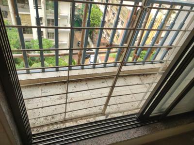 Balcony Image of 800 Sq.ft 1 BHK Apartment / Flat for sale in Ram Nagar Shanti Garden Sector 5 Bldg 9, Mira Road East Mira Bhayandar for Rs. 8000000