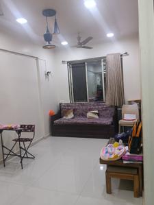 Living Room Image of 675 Sq.ft 1 BHK Apartment / Flat for sale in SP Krishna Aangan Complex, Vasan Nagar Navi Mumbai for Rs. 4500000