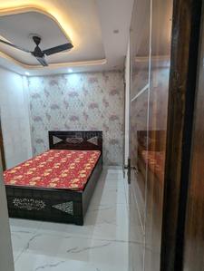 Bedroom Image of 600 Sq.ft 2 BHK Builder Floor for rent in Guru Ji Builders And Developers 1, Dwarka Mor New Delhi for Rs. 19500