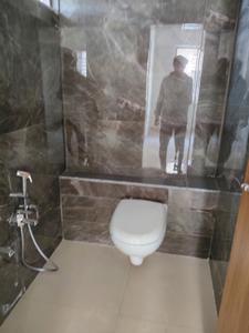 Common Bathroom Image of 1161 Sq.ft 2 BHK Apartment / Flat for sale in Krishna Orchid, Nana Chiloda Ahmedabad for Rs. 3300000