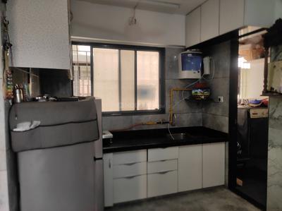 Kitchen Image of 1058 Sq.ft 2 BHK Apartment / Flat for sale in Rushikesh Vaishnodevi Residency, Kosad Gam Surat for Rs. 3500000
