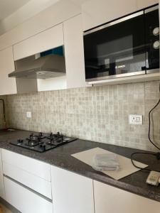 Kitchen Image of 1545 Sq.ft 3 BHK Apartment / Flat for rent in Godrej Woods, Sector 43 Noida for Rs. 75000