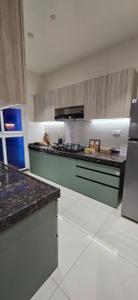 Kitchen Image of 1012 Sq.ft 2 BHK Apartment / Flat for sale in Mahindra Vista Phase 2, Kandivali East Mumbai for Rs. 28500000