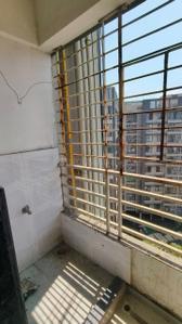 Balcony Image of 1350 Sq.ft 2 BHK Apartment / Flat for rent in Devjit Pramukh Green Plus Bldg H, Chala Vapi for Rs. 17500