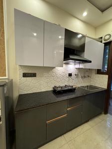 Kitchen Image of 890 Sq.ft 2 BHK Builder Floor for rent in Rajouri Garden New Delhi for Rs. 32000