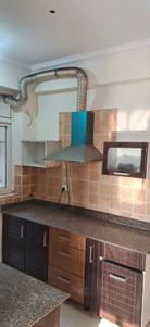 Kitchen Image of 1100 Sq.ft 2 BHK Apartment / Flat for rent in Amrapali Eden Park, Sector 50 Noida for Rs. 32000