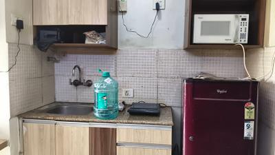 Kitchen Image of 450 Sq.ft 1 RK Apartment / Flat for rent in Supertech Ecociti, Sector 137 Noida for Rs. 19000