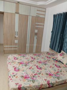 Bedroom Image of 1100 Sq.ft 2 BHK Apartment / Flat for rent in Shagoon Green, Gunjan Vapi for Rs. 10000