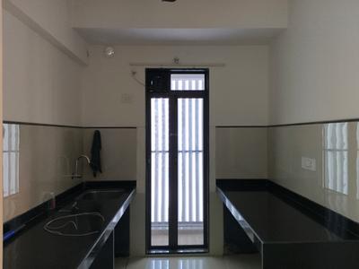 Kitchen Image of 609 Sq.ft 1 BHK Apartment / Flat for rent in Runwal Gardens, Dombivli East Thane for Rs. 14000