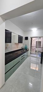 Kitchen Image of 1300 Sq.ft 3 BHK Apartment / Flat for rent in Nyati Era III, Dhanori Pune for Rs. 34000