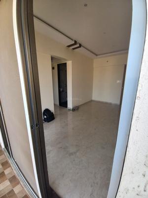 Balcony Image of 710 Sq.ft 1 BHK Apartment / Flat for sale in Ulhasnagar Thane for Rs. 4800000