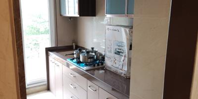 Kitchen Image of 1100 Sq.ft 2 BHK Apartment / Flat for rent in Tharwanis Sky View, Kharghar Navi Mumbai for Rs. 45000
