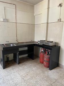 Kitchen Image of 580 Sq.ft 1 BHK Apartment / Flat for rent in Bandal Complex, Kothrud Pune for Rs. 19000
