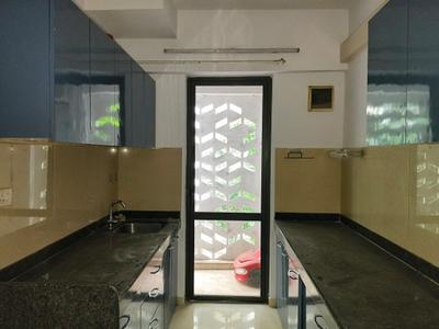 Kitchen Image of 936 Sq.ft 2 BHK Apartment / Flat for rent in Lodha Palava Downtown, Palava Phase 2 Thane for Rs. 19000