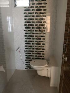 Common Bathroom Image of 639 Sq.ft 1 BHK Apartment / Flat for sale in Greenscape Bhagwat Greens, Narolgam Ahmedabad for Rs. 1911000