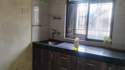Kitchen Image of 750 Sq.ft 1 BHK Apartment / Flat for rent in  Govind Apartment, Kopar Khairane Navi Mumbai for Rs. 28000
