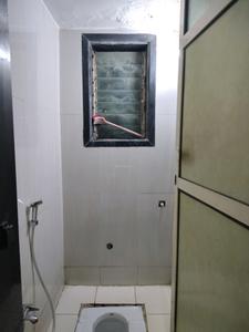 Common Bathroom Image of 550 Sq.ft 1 BHK Apartment / Flat for rent in Puraniks Kanchan Pushp Society, Kasarvadavali Thane for Rs. 17999