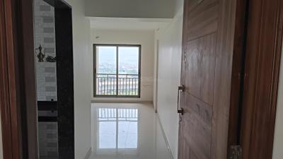 Living Room Image of 1050 Sq.ft 2 BHK Apartment / Flat for rent in National Trinity Paradise Phase 1, Shilphata Thane for Rs. 17500