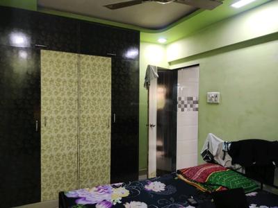 Bedroom Image of 885 Sq.ft 2 BHK Apartment / Flat for sale in Thakurli Thane for Rs. 6800000