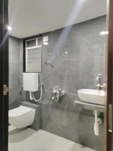 Common Bathroom Image of 830 Sq.ft 2 BHK Apartment / Flat for sale in Shripal Sattva, Vasai West Vasai for Rs. 5940000