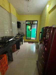 Kitchen Image of 650 Sq.ft 1 BHK Apartment / Flat for sale in Rukhmini Garden, Titwala Thane for Rs. 2450000