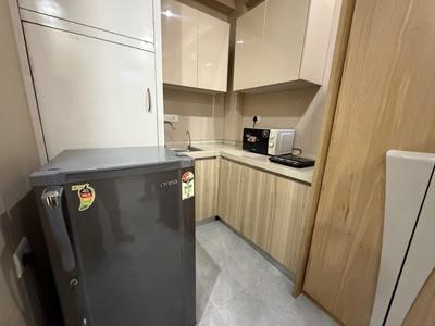 Kitchen Image of 600 Sq.ft 1 RK Studio for rent in Sun City, Sector 54 Gurgaon for Rs. 17000