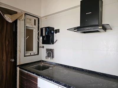 Kitchen Image of 950 Sq.ft 2 BHK Apartment / Flat for sale in Dheeraj Jade Residences , Wagholi Pune for Rs. 7400000