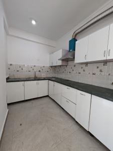 Kitchen Image of 1259 Sq.ft 3 BHK Apartment / Flat for sale in SDS NRI Residency, Omega II Greater Noida for Rs. 9800000