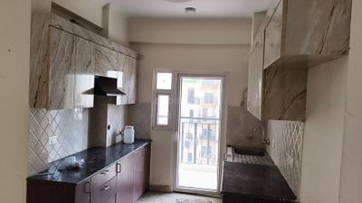 Kitchen Image of 1185 Sq.ft 3 BHK Apartment / Flat for rent in Amrapali Centurian Park, Noida Extension Greater Noida for Rs. 23000