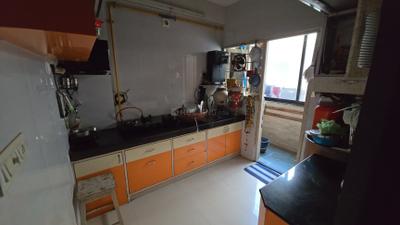 Kitchen Image of 1035 Sq.ft 2 BHK Apartment / Flat for sale in Devnandan Parisar, Adalaj Gandhinagar for Rs. 4700000