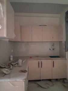 Kitchen Image of 980 Sq.ft 2 BHK Apartment / Flat for sale in GCM Gomati Apartment, Sector 49 Noida for Rs. 4600006