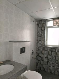 Common Bathroom Image of 1000 Sq.ft 2 BHK Apartment / Flat for sale in Godrej 24, Hinjawadi Pune for Rs. 9800000