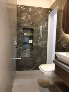 Common Bathroom Image of 1185 Sq.ft 2 BHK Apartment / Flat for sale in Codename Cloud City , Kharghar Navi Mumbai for Rs. 7700000